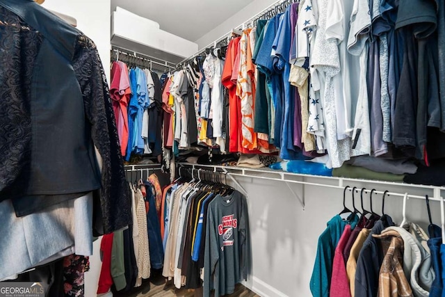 2061 Pinnacle Pointe Dr, Norcross, GA 30071 - spacious closet featuring wood finished floors