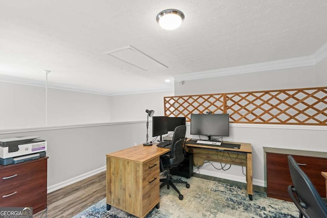 2061 Pinnacle Pointe Dr, Norcross, GA 30071 - office featuring attic access, ornamental molding, wood finished floors, baseboards, and a textured ceiling