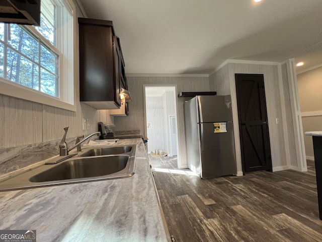 69 Cheyenne Trl, Martin, GA 30557 - kitchen featuring freestanding refrigerator, dark wood finished floors, light countertops, ornamental molding, and dark brown cabinets