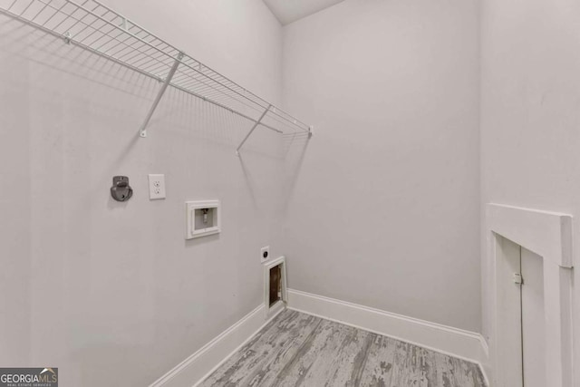 505 Parkview Dr, Milton, GA 30004 - laundry area with hookup for an electric dryer, washer hookup, baseboards, and light wood-style floors