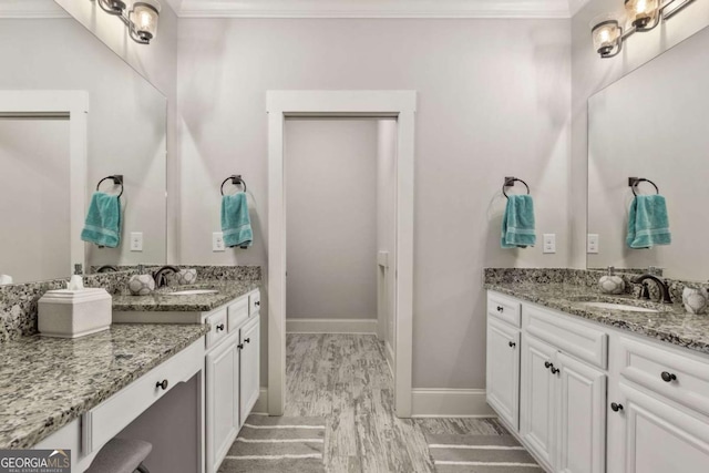 505 Parkview Dr, Milton, GA 30004 - full bath featuring crown molding, two vanities, and baseboards
