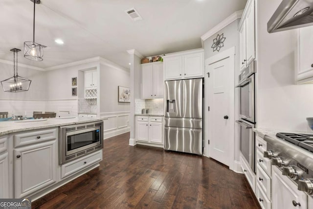 505 Parkview Dr, Milton, GA 30004 - kitchen featuring stainless steel appliances, ornamental molding, range hood, white cabinetry, and dark wood-style flooring