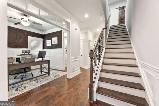 505 Parkview Dr, Milton, GA 30004 - office space with a decorative wall, crown molding, a ceiling fan, a wainscoted wall, and dark wood-type flooring