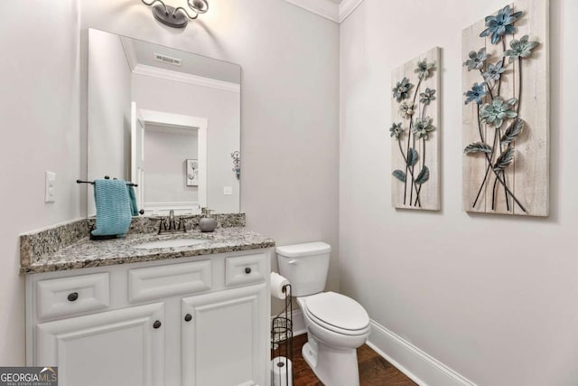 505 Parkview Dr, Milton, GA 30004 - bathroom with ornamental molding, toilet, vanity, baseboards, and wood finished floors