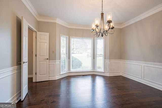 214 Jamestown Ave, Jonesboro, GA 30236 - empty room featuring a chandelier, dark wood-style flooring, crown molding, a wainscoted wall, and a decorative wall