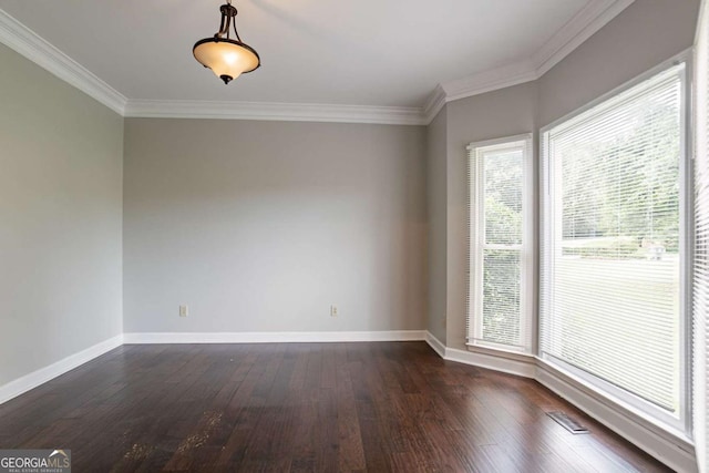 214 Jamestown Ave, Jonesboro, GA 30236 - empty room with ornamental molding and dark wood-style flooring