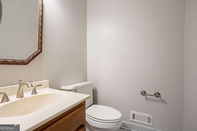 214 Jamestown Ave, Jonesboro, GA 30236 - half bathroom with toilet and vanity