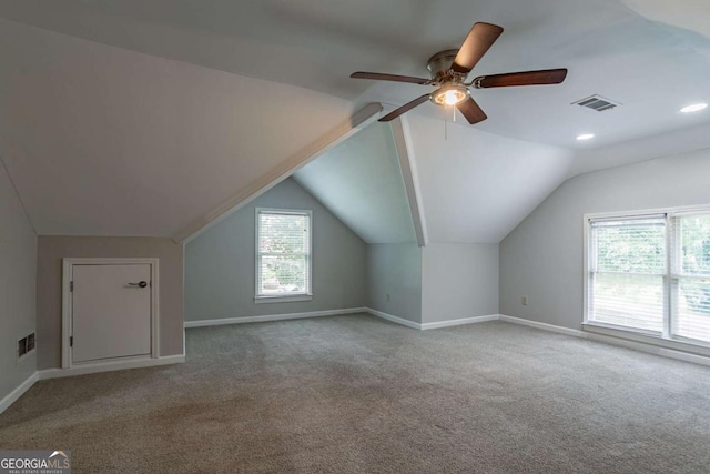 214 Jamestown Ave, Jonesboro, GA 30236 - additional living space featuring healthy amount of natural light, carpet floors, a ceiling fan, and lofted ceiling