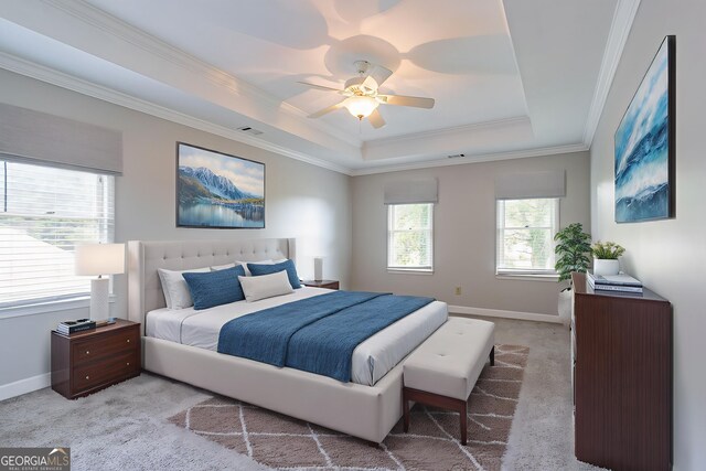 214 Jamestown Ave, Jonesboro, GA 30236 - bedroom with a raised ceiling, light colored carpet, ornamental molding, and a ceiling fan