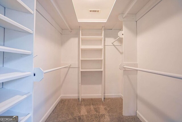 214 Jamestown Ave, Jonesboro, GA 30236 - spacious closet featuring carpet