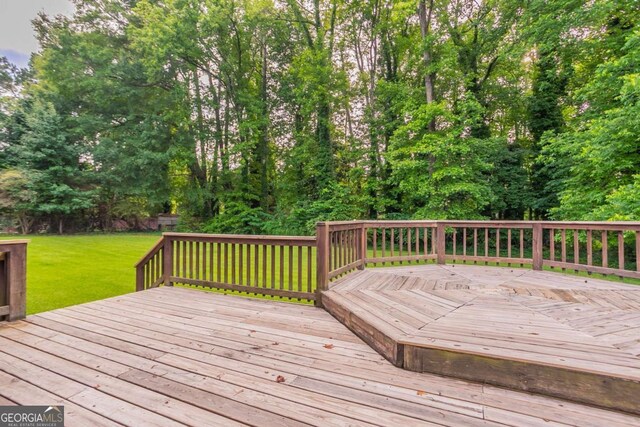 214 Jamestown Ave, Jonesboro, GA 30236 - wooden deck with a yard