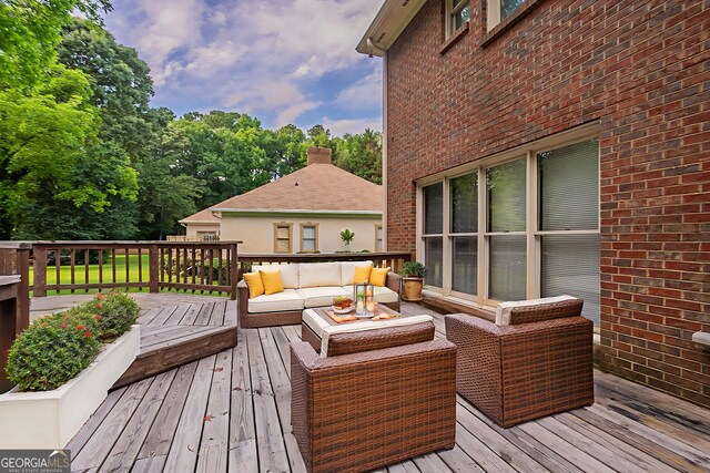 214 Jamestown Ave, Jonesboro, GA 30236 - wooden terrace featuring an outdoor hangout area