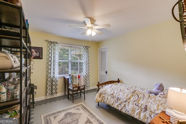 75 Barber Rd, Carrollton, GA 30116 - bedroom with baseboards and a ceiling fan