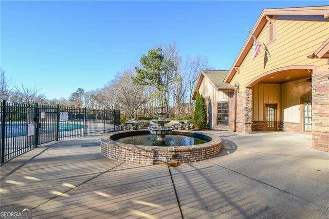 1480 Waverly Glen Dr, Alpharetta, GA 30004 - view of home's community with a patio area