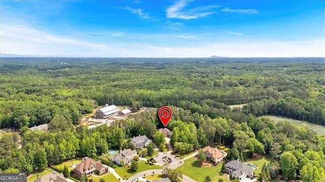 511 Etris Ct, Roswell, GA 30075 - aerial overview of property's location with a heavily wooded area