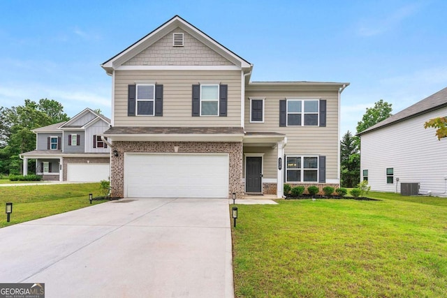 228 Whitneys Way, Dallas, GA 30157 - view of front of house with brick siding, a garage, a front yard, and driveway