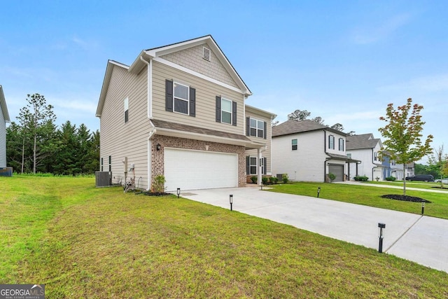 228 Whitneys Way, Dallas, GA 30157 - view of front of house with a garage, driveway, brick siding, and a front yard