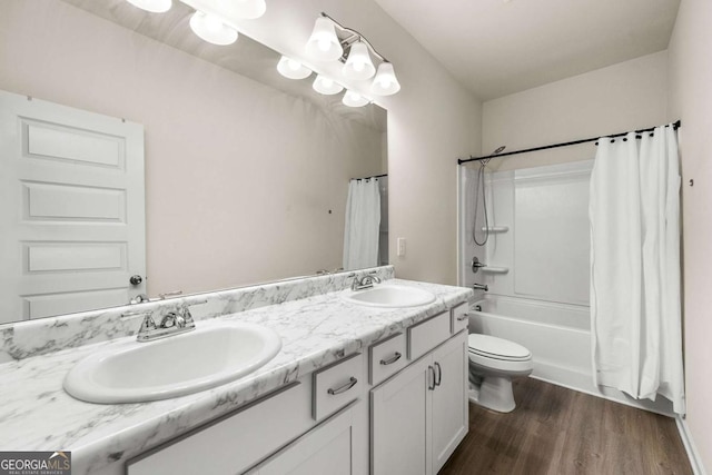 228 Whitneys Way, Dallas, GA 30157 - full bath featuring wood finished floors, double vanity, and shower / bathtub combination with curtain