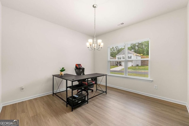 228 Whitneys Way, Dallas, GA 30157 - dining area with wood finished floors, a desk, and a chandelier