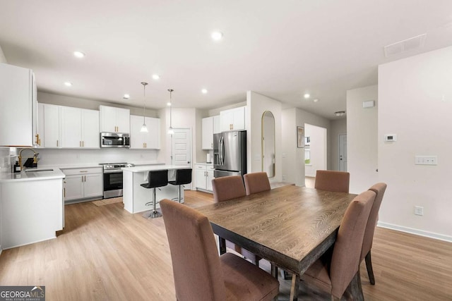 228 Whitneys Way, Dallas, GA 30157 - dining space featuring light wood-style flooring and recessed lighting