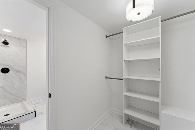 2310 Toussaint Ave, Savannah, GA 31404 - walk in closet featuring marble finish floors