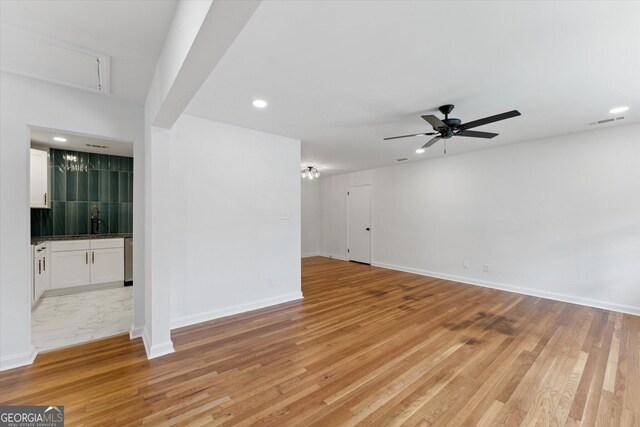 2310 Toussaint Ave, Savannah, GA 31404 - unfurnished room featuring ceiling fan, light wood-type flooring, attic access, and recessed lighting
