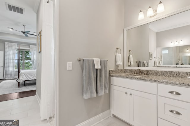 109 Carrington Ct, Kingsland, GA 31548 - full bathroom with ensuite bathroom, ceiling fan, vanity, crown molding, and tile patterned flooring