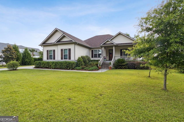 109 Carrington Ct, Kingsland, GA 31548 - view of front facade featuring covered porch, a front yard, and roof with shingles