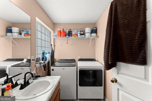 8436 Cyprus Ridge Way, Douglasville, GA 30134 - laundry area featuring washer and clothes dryer and a textured ceiling