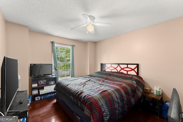 8436 Cyprus Ridge Way, Douglasville, GA 30134 - bedroom with hardwood / wood-style floors, a ceiling fan, and a textured ceiling