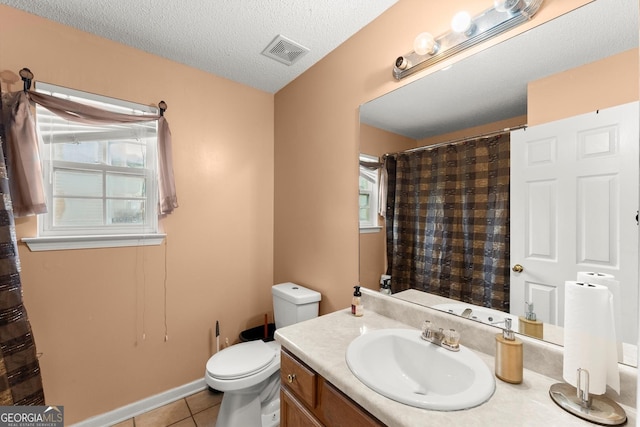 8436 Cyprus Ridge Way, Douglasville, GA 30134 - bathroom featuring vanity, toilet, tile patterned flooring, a textured ceiling, and curtained shower