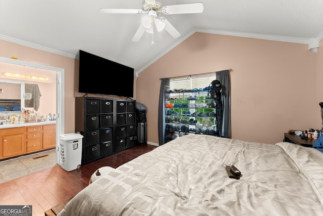 8436 Cyprus Ridge Way, Douglasville, GA 30134 - bedroom featuring wood finished floors, lofted ceiling, ornamental molding, a ceiling fan, and ensuite bathroom
