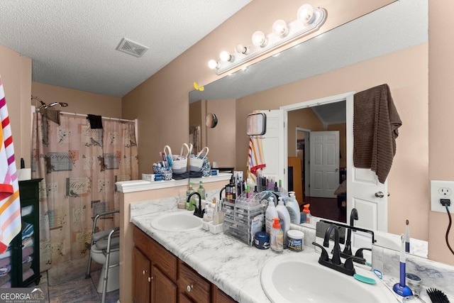 8436 Cyprus Ridge Way, Douglasville, GA 30134 - full bath with double vanity, toilet, curtained shower, and a textured ceiling