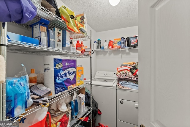 8436 Cyprus Ridge Way, Douglasville, GA 30134 - washroom with separate washer and dryer and a textured ceiling