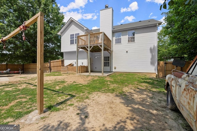 8436 Cyprus Ridge Way, Douglasville, GA 30134 - rear view of property with a chimney, a patio, and a deck