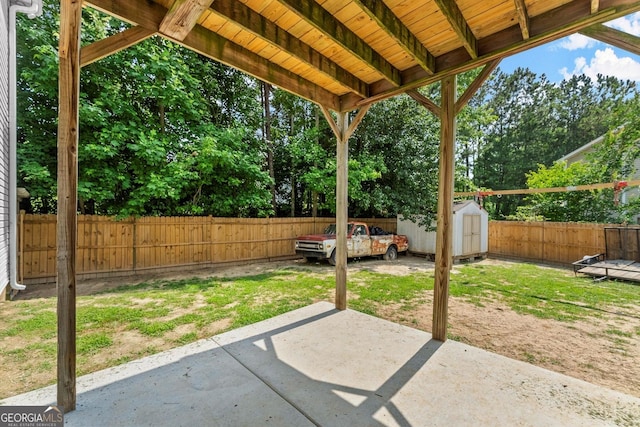 8436 Cyprus Ridge Way, Douglasville, GA 30134 - fenced backyard with a patio and view of scattered trees