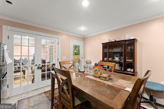 8436 Cyprus Ridge Way, Douglasville, GA 30134 - dining room with french doors, ornamental molding, recessed lighting, and light tile patterned floors