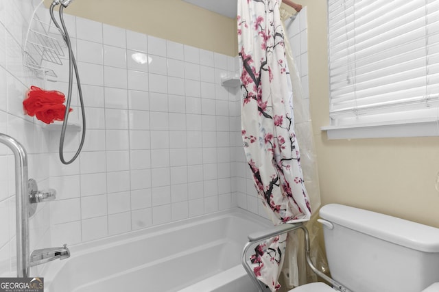 214 Highland Dr, Warner Robins, GA 31088 - bathroom featuring shower / bath combo and toilet