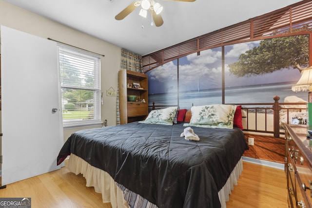 214 Highland Dr, Warner Robins, GA 31088 - bedroom with wood finished floors and a ceiling fan