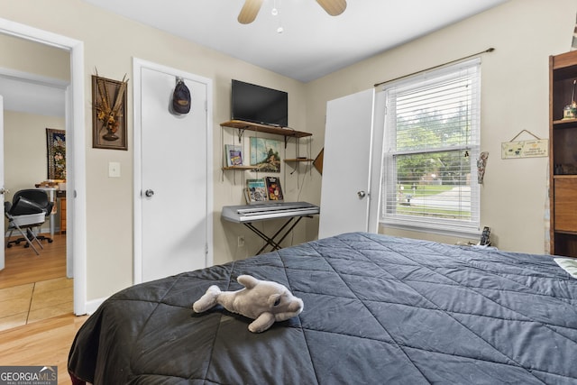 214 Highland Dr, Warner Robins, GA 31088 - bedroom with wood finished floors and ceiling fan