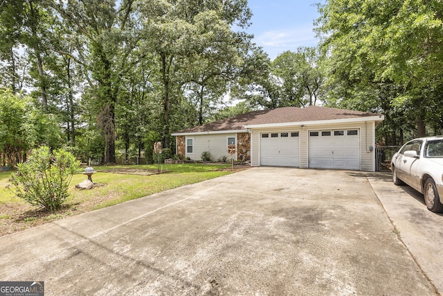 214 Highland Dr, Warner Robins, GA 31088 - view of front of property featuring a front lawn and concrete driveway