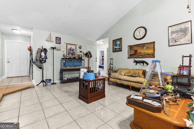 214 Highland Dr, Warner Robins, GA 31088 - living room with light tile patterned flooring, lofted ceiling, and baseboards