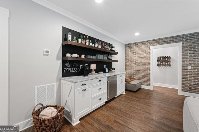 221 Goss Ln, Ball Ground, GA 30107 - indoor dry bar with fridge, brick wall, dark wood-style floors, ornamental molding, and recessed lighting