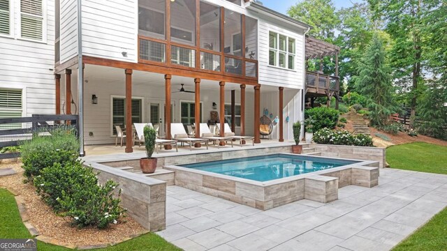 221 Goss Ln, Ball Ground, GA 30107 - back of property featuring a patio area, a ceiling fan, a wooden deck, and a pergola