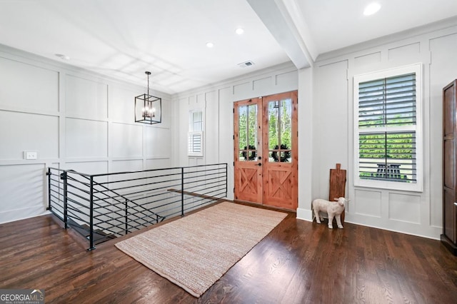 221 Goss Ln, Ball Ground, GA 30107 - entryway with a decorative wall, a chandelier, wood finished floors, recessed lighting, and beamed ceiling