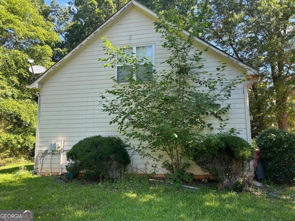 2581 Star Ln, Decatur, GA 30034 - view of side of home with a lawn