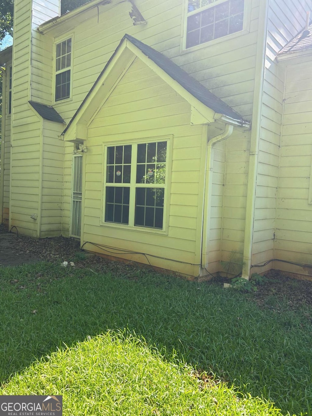 2581 Star Ln, Decatur, GA 30034 - view of home's exterior with a yard and a chimney