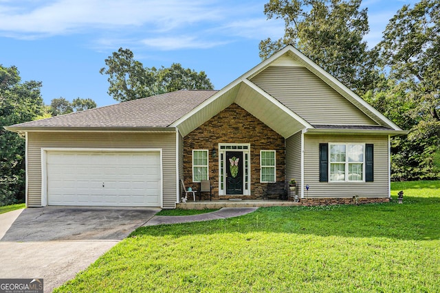 259 Hanover Cir SE, Calhoun, GA 30701 - view of front of property featuring driveway, an attached garage, a front yard, a shingled roof, and stone siding