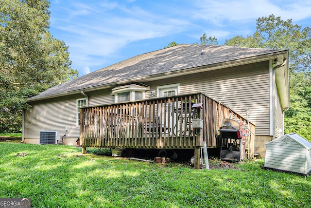259 Hanover Cir SE, Calhoun, GA 30701 - back of property with a yard, a wooden deck, and roof with shingles