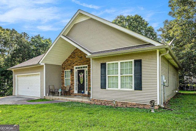 259 Hanover Cir SE, Calhoun, GA 30701 - view of front facade with a front lawn, an attached garage, stone siding, and roof with shingles